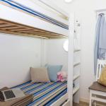 Slide Chambre enfants avec lits surperposés d'un des logements