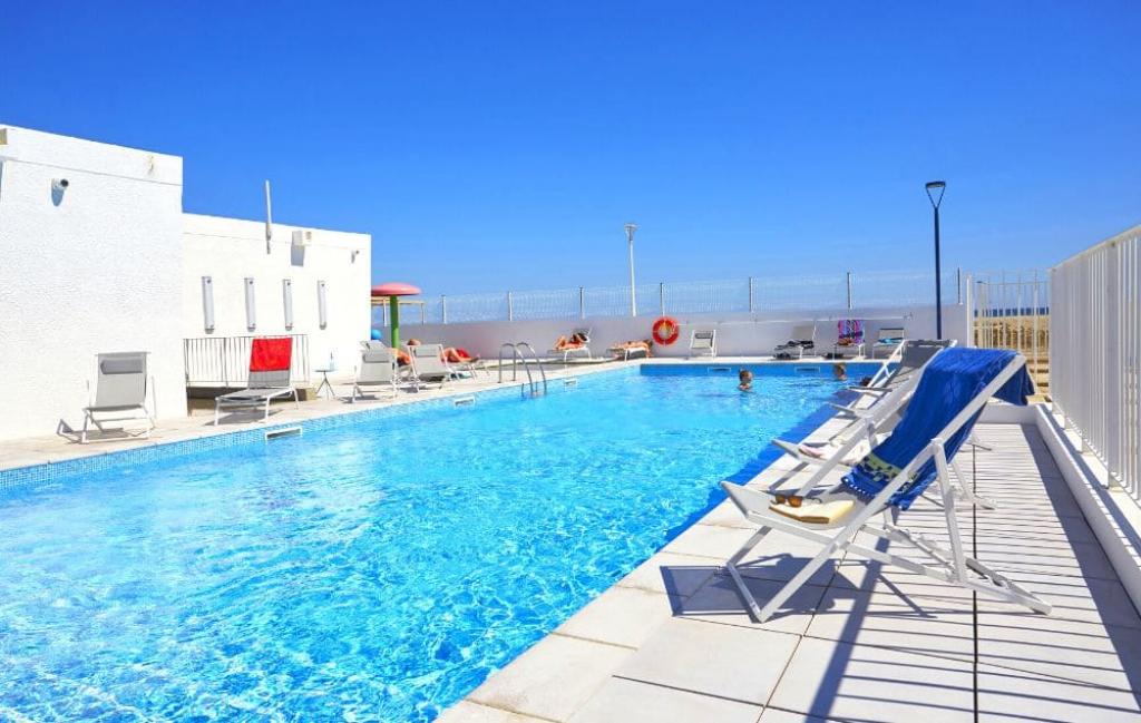 Slide Résidence Les Carrats à Port Leucate - Piscine extérieure