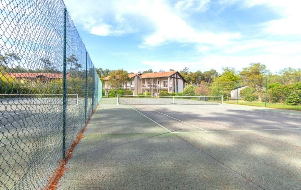 Slide Résidence l'Allée des Dunes à Ondres - Terrain de tennis